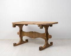 Antique Swedish trestle table from Northern Sweden made during the mid 1700s. The table is solid and primitive with a simple construction
