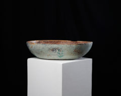 Painted folk art bowl from northern Sweden made during the early 1800s, around 1820. The bowl has an oval shape and has been hollowed out by hand
