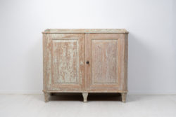 Antique Swedish gustavian sideboard from Northern Sweden made around the year 1800. The sideboard is a genuine gustavian antique with the classic straight shape