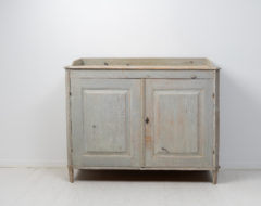 Rare antique gustavian sideboard from Northern Sweden made around 1780. The sideboard is made in painted pine and dry scraped by hand down to the original paint