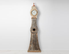 Tall long case clock in a classic rococo shape made in folk art. The clock is from northern Sweden and made around 1820 to 1840.