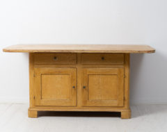 Antique Swedish low sideboard made around 1840. The sideboard is a well-crafted furniture made completely by hand in pine