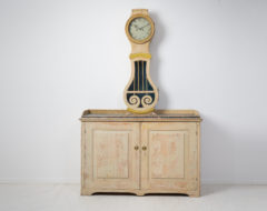 Rare antique clock cabinet from Sweden made during the transitional time between the gustavian and empire period. The cabinet is from Northern Sweden