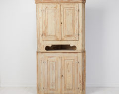 Antique gustavian corner cabinet from northern Sweden made during the early 19th century, around 1820. The cabinet is a country house furniture