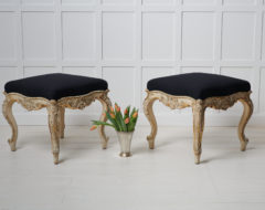 Pair of large upholstered stools in rococo style made during the rococo revival in the late 19th century. The stools are unusually large