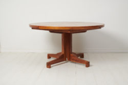 Scandinavian modern dining table from Sweden made during the mid 20th century, around 1950 to 1960. The table is stylish and elegant