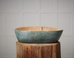 Rare antique wood bowl from Sweden with an oval shape and straight edges. The paint is original to the bowl and also very rare