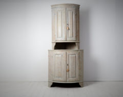 Antique gustavian corner cabinet from northern Sweden made during the last years of the 18th century, around 1790. The cabinet is in two parts