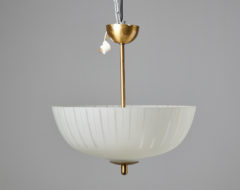 Vintage Swedish ceiling light from around the 1940 with a cover in glass and suspension in brass. The light has three light sources
