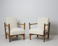 Swedish grace upholstered armchairs from the early 20th century, around 1920 to 1930. The armchairs are unusual, in style of Axel Einar Hjort