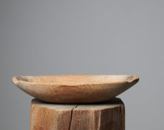 Antique wood trough bowl in folk art from Sweden made during the mid 1800s, around 1850. The bowl is a utility item which was used daily