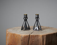 Pair of Arts and Crafts candlesticks from Sweden made around the year 1900. The candlesticks are in the style of the arts and crafts moment