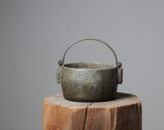 Antique folk art pot hand-made in northern Sweden during the mid 1800s. The pot was an everyday utility item made in soapstone