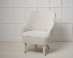 Swedish modern vintage armchair from the 1930s to 1940s that's been newly renovated. The armchair has renovated padding with new upholstery
