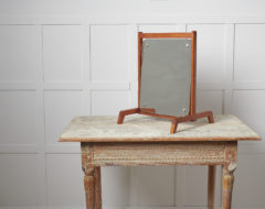 Vintage teak table mirror from Sweden. The mirror is made around the 1960s and is a timeless interior design item with plenty of retro charm
