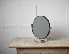 Art deco table mirror from Sweden made around the 1930s. The mirror has a chromed frame and an adjustable mirror.