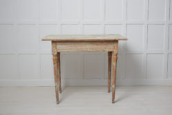 Genuine antique console table from the late gustavian period. The table is an authentic Swedish country house furniture made by hand in pine