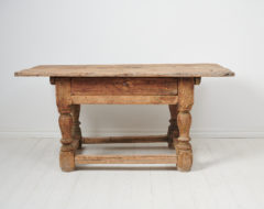 Unique Swedish baroque table made by hand during the mid 1700s. The table is a very rare example of early Swedish furniture and has a frame in pine with heavy, solid lathed legs.