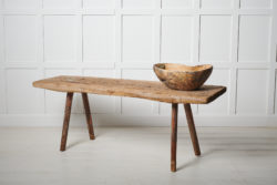 Antique primitive Swedish bench in folk art from northern Sweden. The bench is made during the first few years of the 19th century, around 1810 to 1820