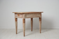 Antique Swedish gustavian table from around 1810. The table is gustavian, also known as neoclassic, and made in solid Swedish pine