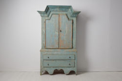 Rare Swedish blue cabinet in folk art from around 1820. This type of cabinet was only made and can only be found the county Jämtland