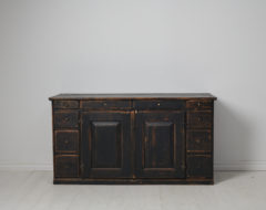 Swedish antique country sideboard from the 1800s. The sideboard is a genuine Swedish country sideboard made by hand in solid pine