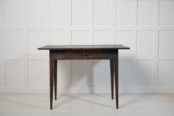 Genuine Swedish antique table with a drawer in gustavian style. The table is made by hand from solid Swedish pine around 1820 to 1830