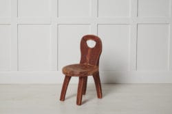 Unusual primitive children's chair in folk art from northern Sweden. The chair is made around 1820 to 1840 and is a unique piece made by hand