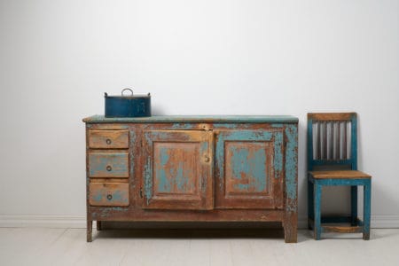 Antique rustic low sideboard from the early 1800s, around 1820 to 1840. Step back in time with this captivating antique rustic low sideboard,