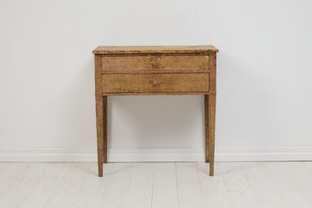 Swedish antique small table in Gustavian style, also known as neoclassical style. The table is handcrafted from solid pine, dating back to around 1790 to 1810