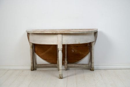 Antique Swedish console table from the early 1800s, circa 1810 to 1820. The table is handcrafted in solid pine and remains in untouched condition