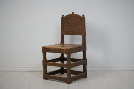 Unusually large baroque chair from Sweden made around 1770. The chair has a frame in solid pine with original faux paint