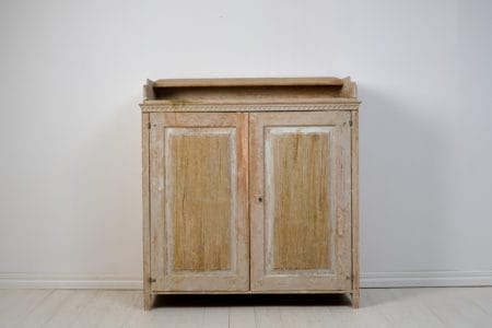 Large genuine Gustavian sideboard from Northern Sweden, made around 1810. The sideboard is crafted from solid pine and scraped by hand down to the original paint