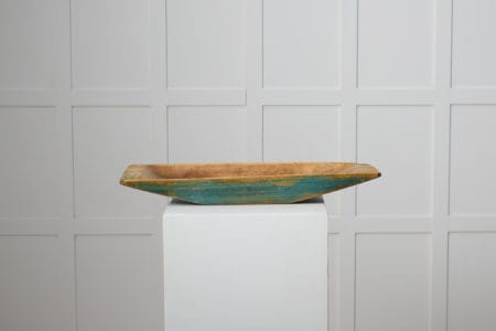 Antique Swedish wooden plate or trough made in northern Sweden around 1820 to 1840. The trough has original blue paint