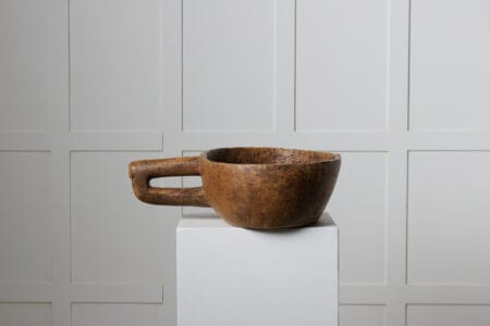 Rare Swedish antique bowl from the late 1700s. This wooden bowl is oval with a carved handle on the side. Made by hand from a single piece of birch root