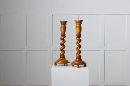 Pair of Swedish empire candlesticks from around 1840 to 1850. The candlesticks are made by hand with a frame in solid birch with elements of birch root