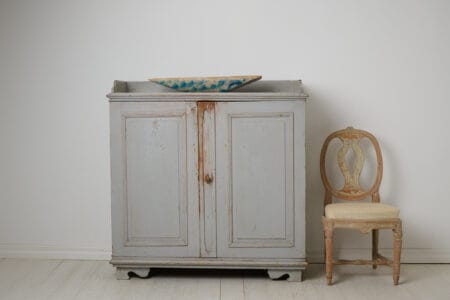 Antique Swedish rustic sideboard from northern Sweden. The sideboard is an authentic country house furniture from around 1840.