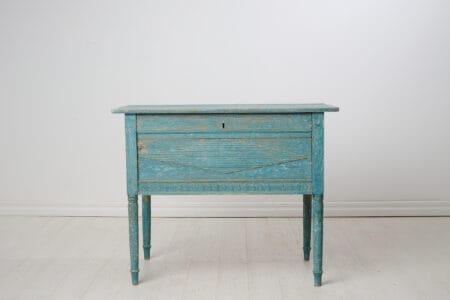 Antique Swedish country table from the late gustavian period around 1810. The table has original blue paint - blue is an unusual colour