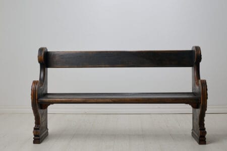 Antique Swedish rustic bench from the early 1800s. Freestanding bench for three to four people. The bench most likely originates from a church in northern Sweden