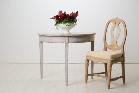 Antique Swedish demi-lune table from the mid 1800s. The table is freestanding and made by hand in solid pine in northern Sweden around 1850