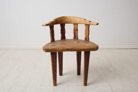 Unique rustic primitive chair in folk art from the early 19th century, northern Sweden. The chair is made by hand in solid pine