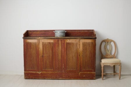Rare Swedish antique sideboard. The sideboard is a country house furniture from northern Sweden made around 1820. Made by hand with a frame in solid pine.