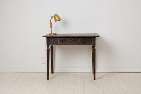Antique Swedish empire desk made by hand in solid pine. The desk is from the empire period in northern Sweden around 1850.
