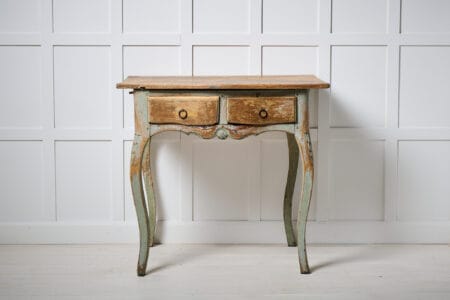 Rare antique side table from the rococo period around 1780. This Swedish antique is one-of-a-kind made by hand in northern Sweden with a frame in solid pine.