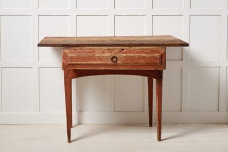 Late 1700s side table from northern Sweden. This folk art antique is made by hand in solid pine and is in original untouched condition.