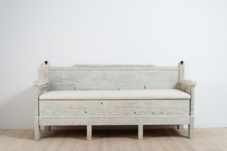 Gustavian provincial sofa from northern Sweden. Hand scraped to the original light blue / green paint. Decorated with carved wooden decor