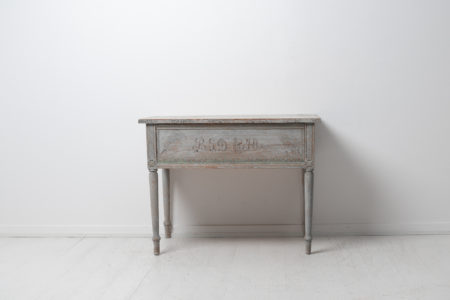 Rare genuine antique table from Northern Sweden. The table is an authentic country house furniture from Sweden and functions as a wall or side table