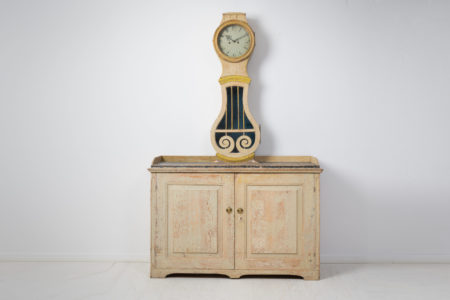 Rare antique clock cabinet from Sweden made during the transitional time between the gustavian and empire period. The cabinet is from Northern Sweden