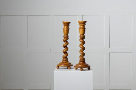 Pair of Swedish empire candlesticks from around 1840 to 1850. The candlesticks are made by hand with a frame in solid birch with elements of birch root