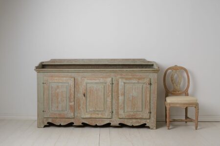 Wide Swedish antique sideboard. This sideboard is a country house furniture from the gustavian period made in northern Sweden around 1790.